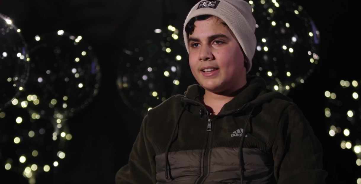 Amir, aged 14, lost his uncles and grandfather when their home was shelled. He was trapped inside for 24 hours before being rescued and had to wait for four days in hospital for surgery.